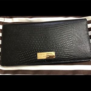 Henri Bendel West 57th kangaroo Wall-Lizard print